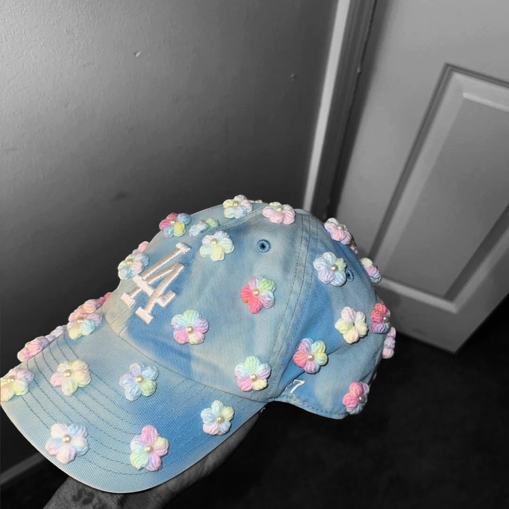 Blue Cap with Floral Accents